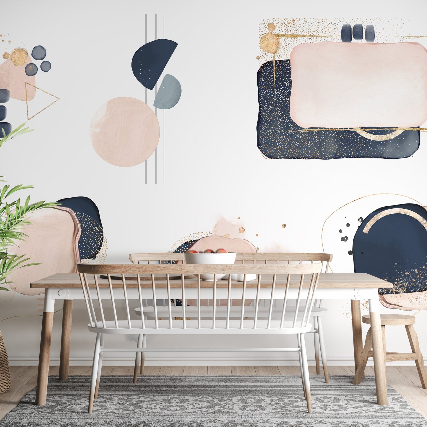 Soft pastel pink and navy wallpaper with bold shapes.