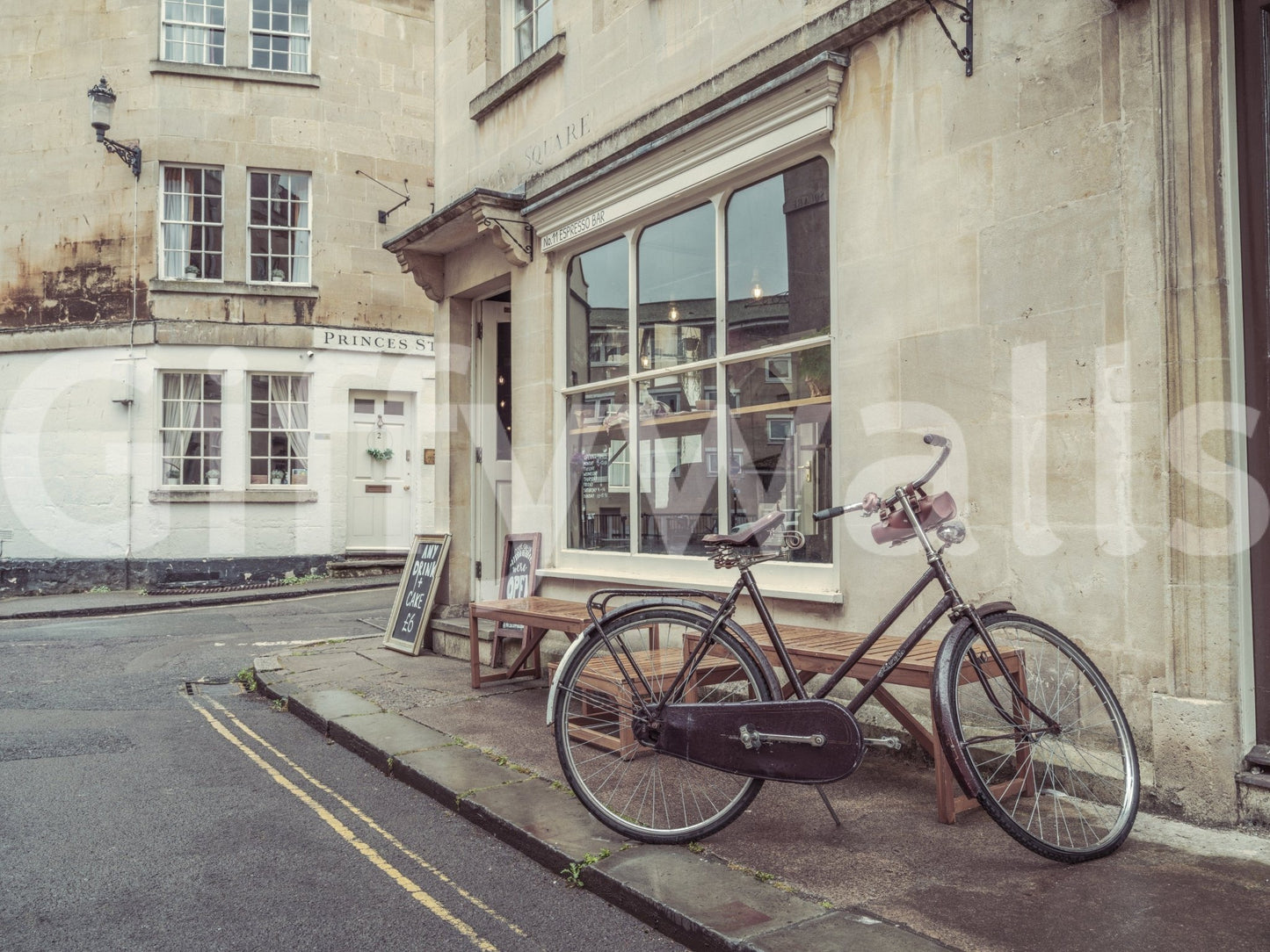 Minimalist wall mural featuring a bicycle for a clean and airy apartment.