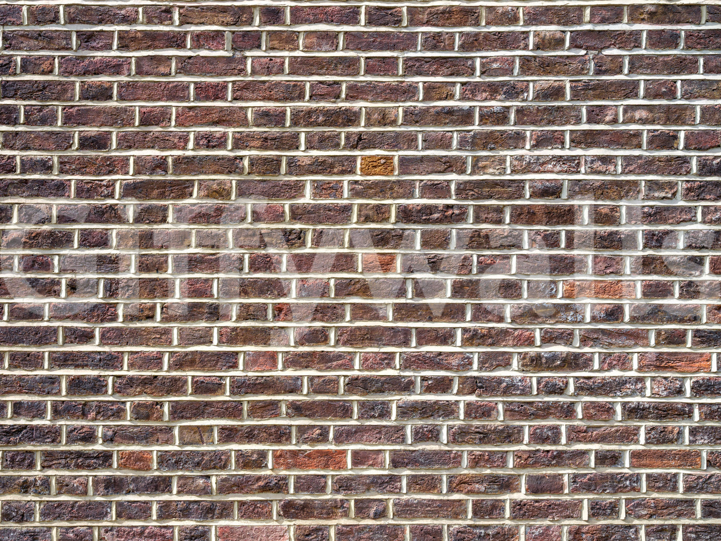 Old-school brick wall mural with raw texture