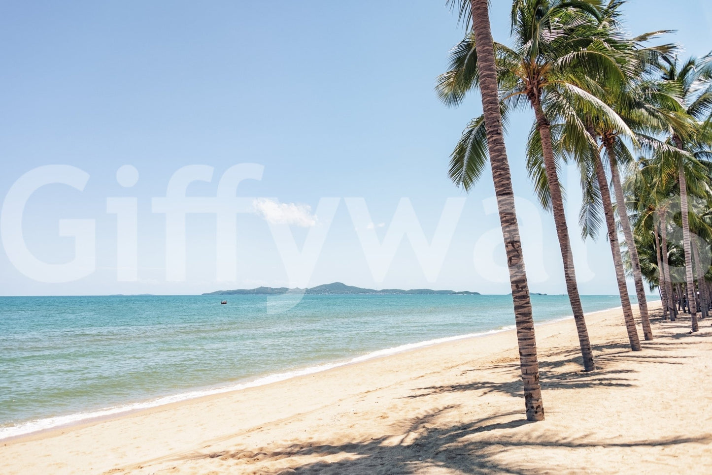 Beach shoreline with palm trees in Coastal Palm Serenity Wall Mural under bright sky, GD8267