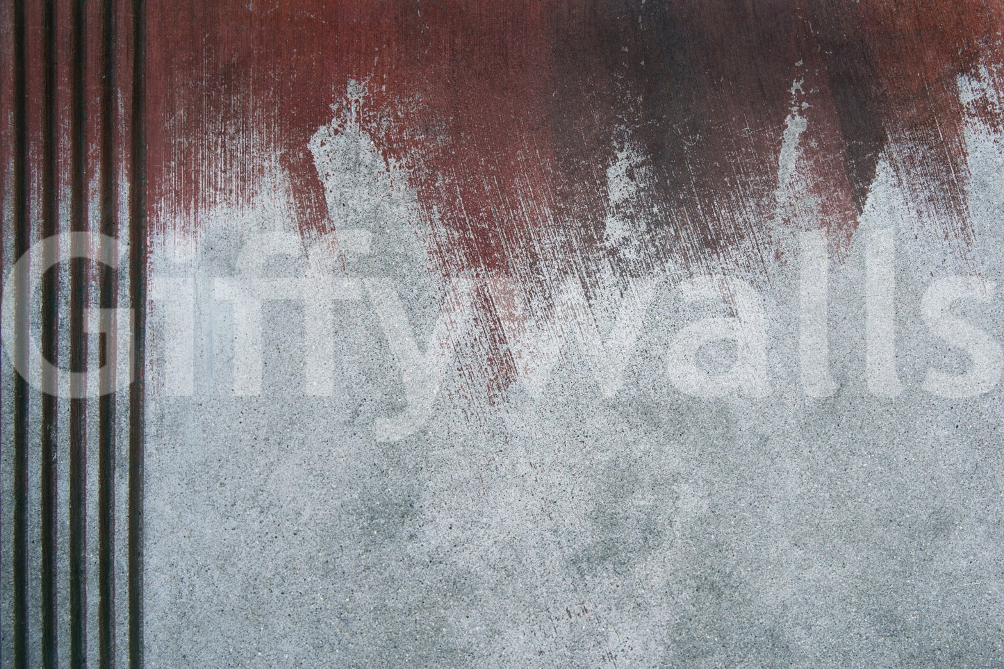 Artistic texture of the Gritty Fade peel and stick mural behind modern furniture.