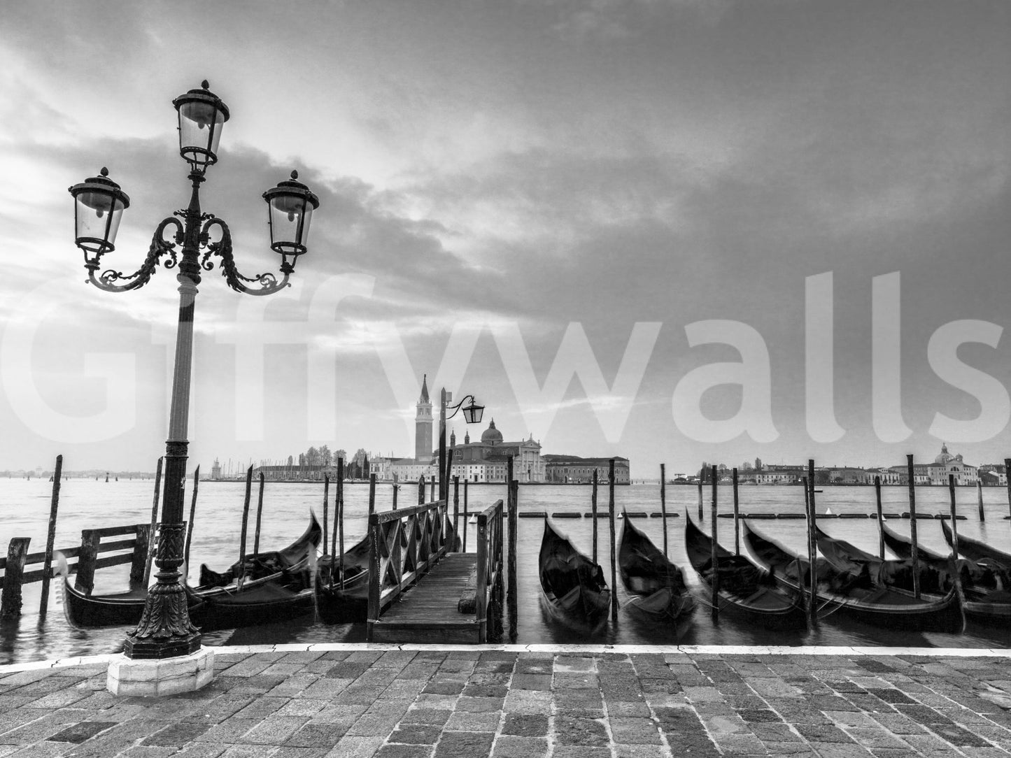 Deep blue and teal tones on a scenic water wallpaper.