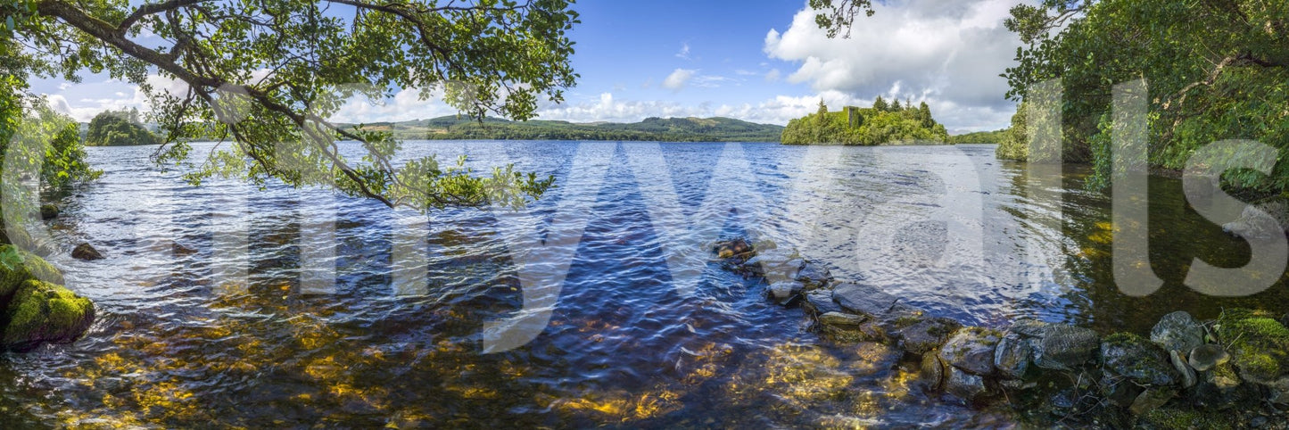 The water reflects the cloudy sky.