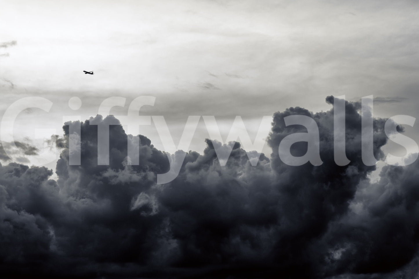 Distant plane flies high above the dark clouds in this Over the Storm wall mural GD4783