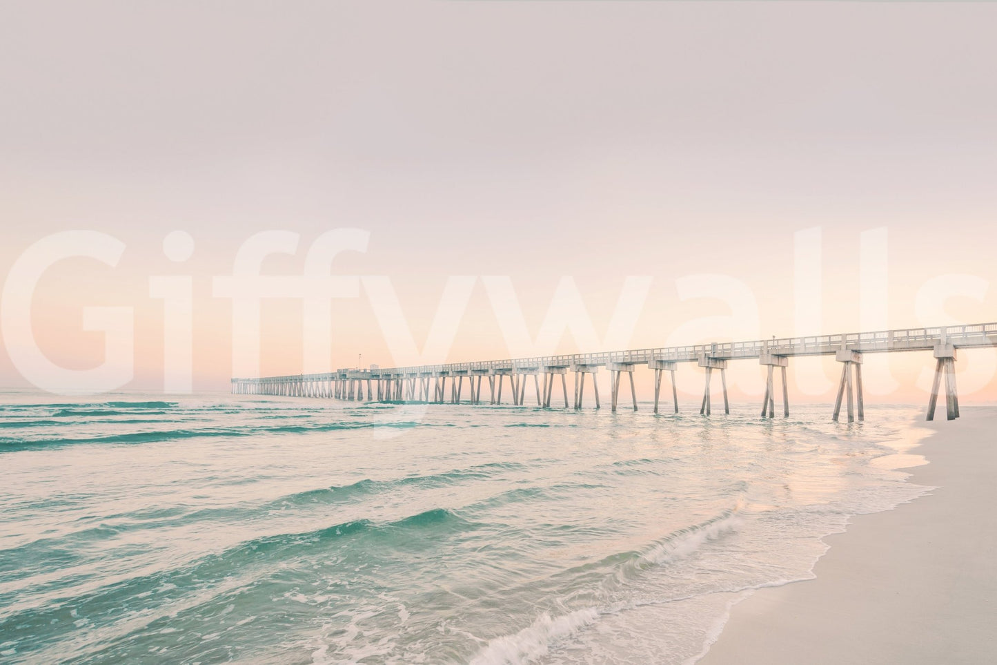 Coastal pier mural bathed in warm evening light