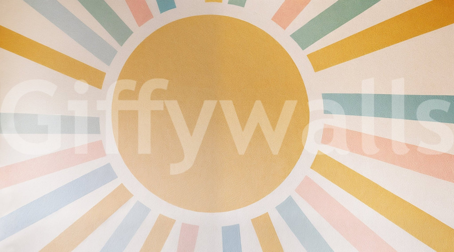 The sun’s rays are visible as soft, golden lines.