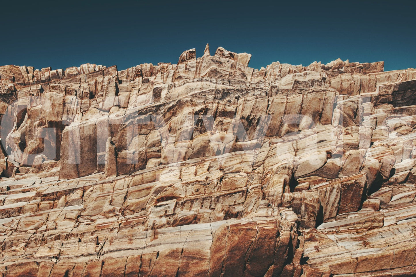 Terracotta Cliffscape mural in a hallway setting.
