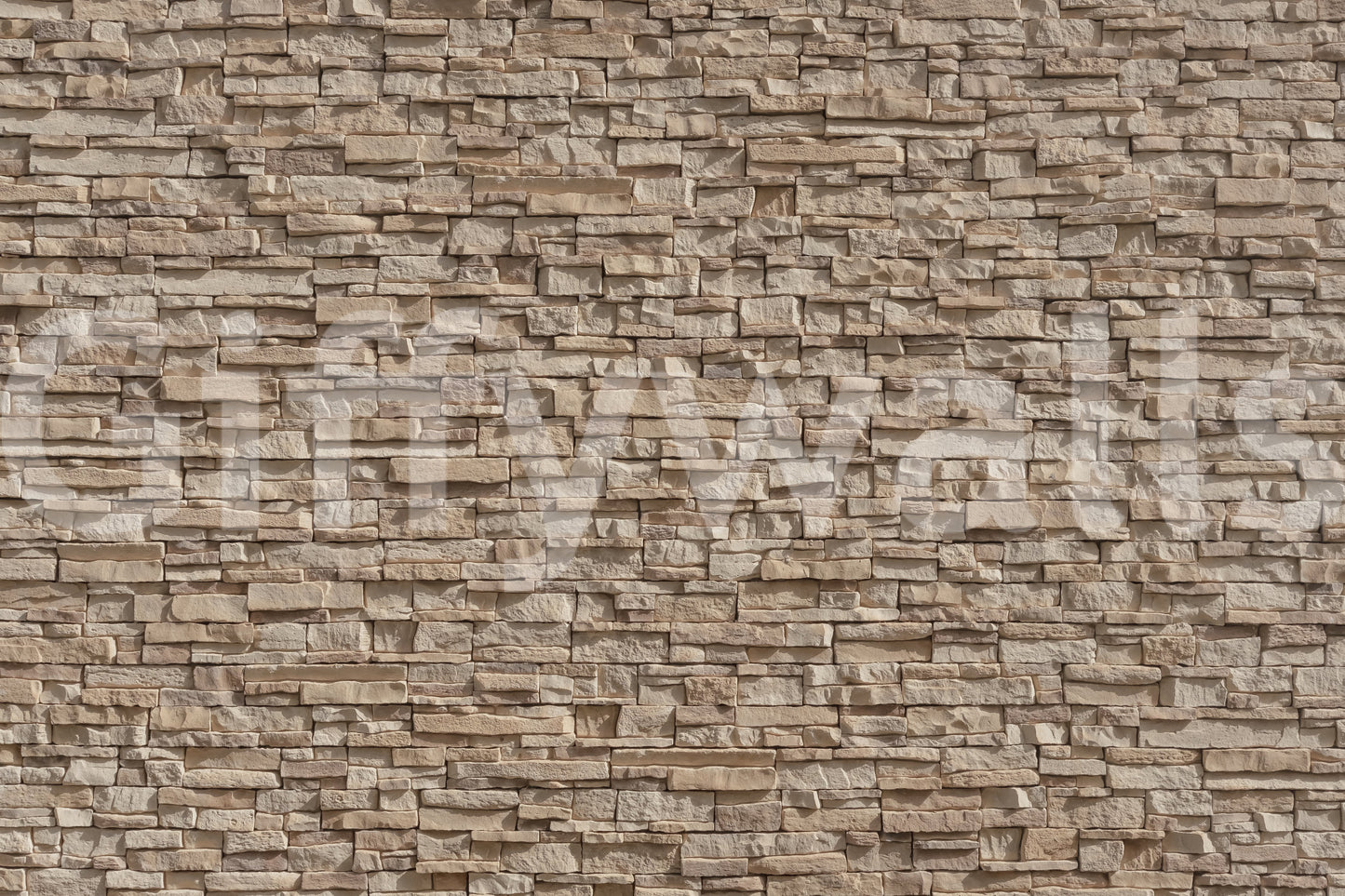 Textured Stone Cladding wallpaper on a living room wall.