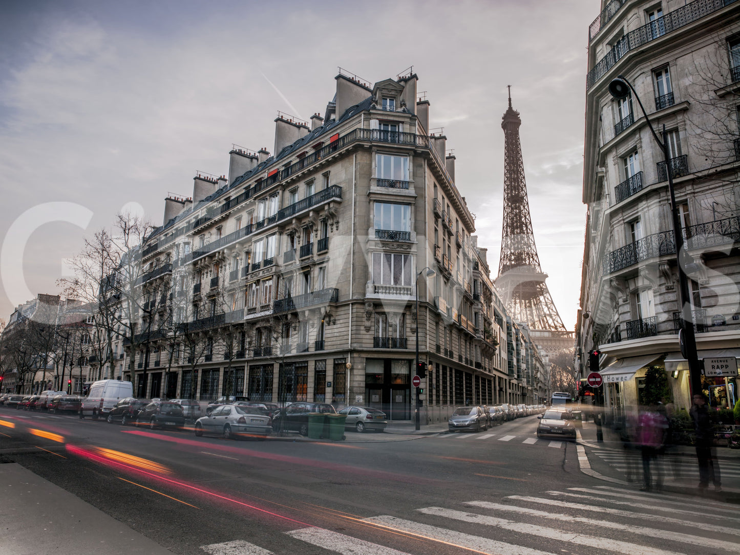 Parisian architecture with evening light and urban street wall mural.