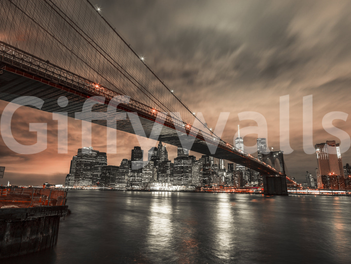 Urban bridge wall mural with glowing windows and a dramatic sunset sky background.