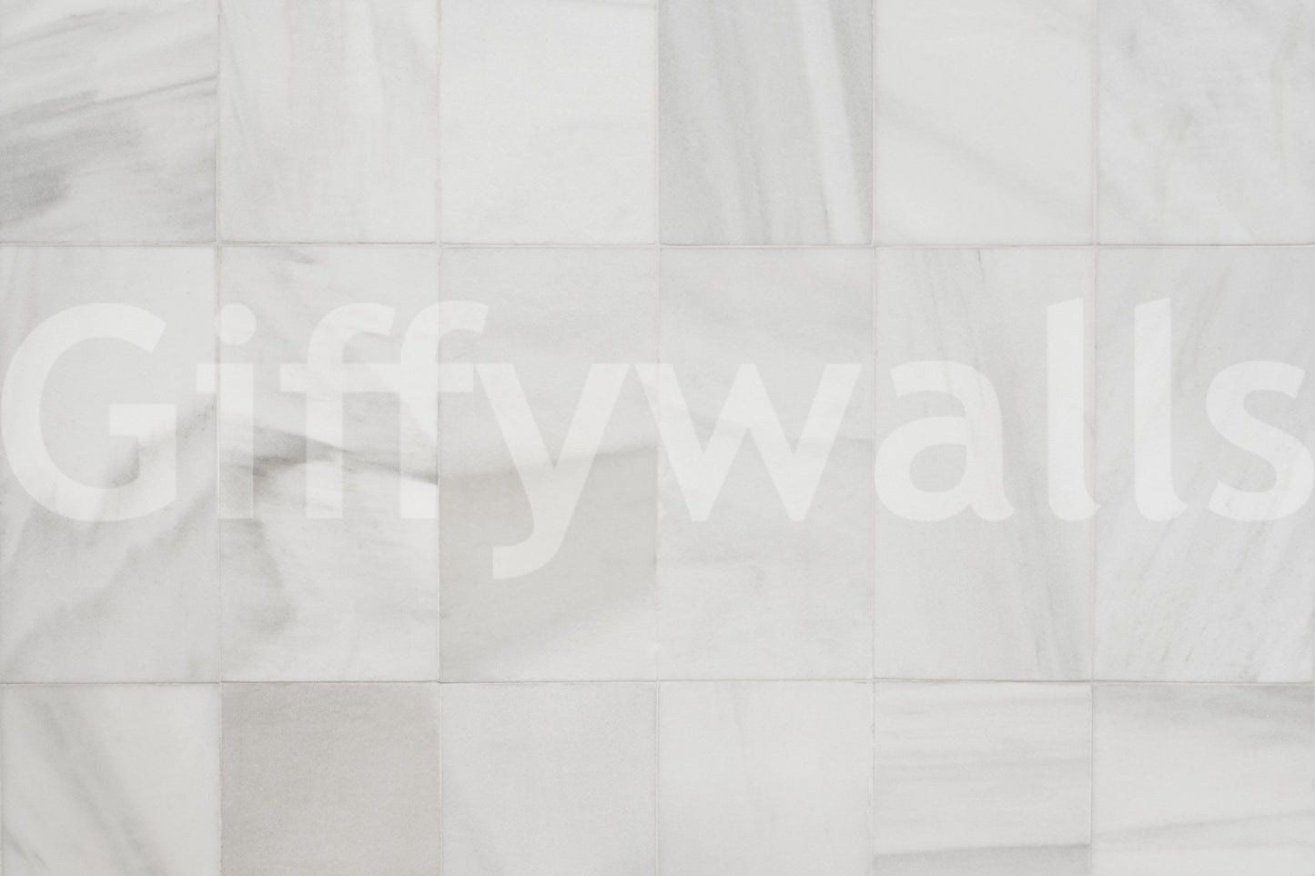 Light, airy texture of the White Stone Blocks peel and stick mural behind a sofa.