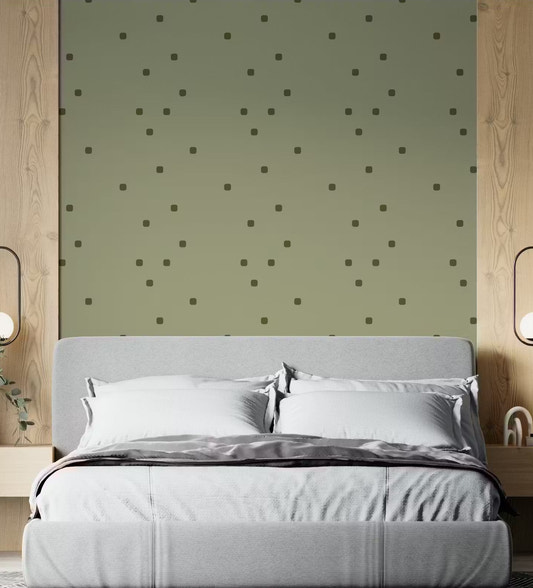 Bedroom wallpaper with organic retro polka dot pattern in green tones.