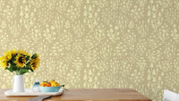 Playful yellow ditsy mushroom wallpaper for lively wall decor.
