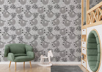 Adorable sloths on leafy branches wallpaper