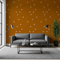 Soft beige rounded square repeat wallpaper in a deep terracotta base pattern