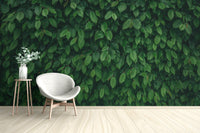 Lush green wallpaper with dense tropical leaves
