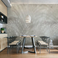 Soft palm leaf wallpaper with neutral tones
