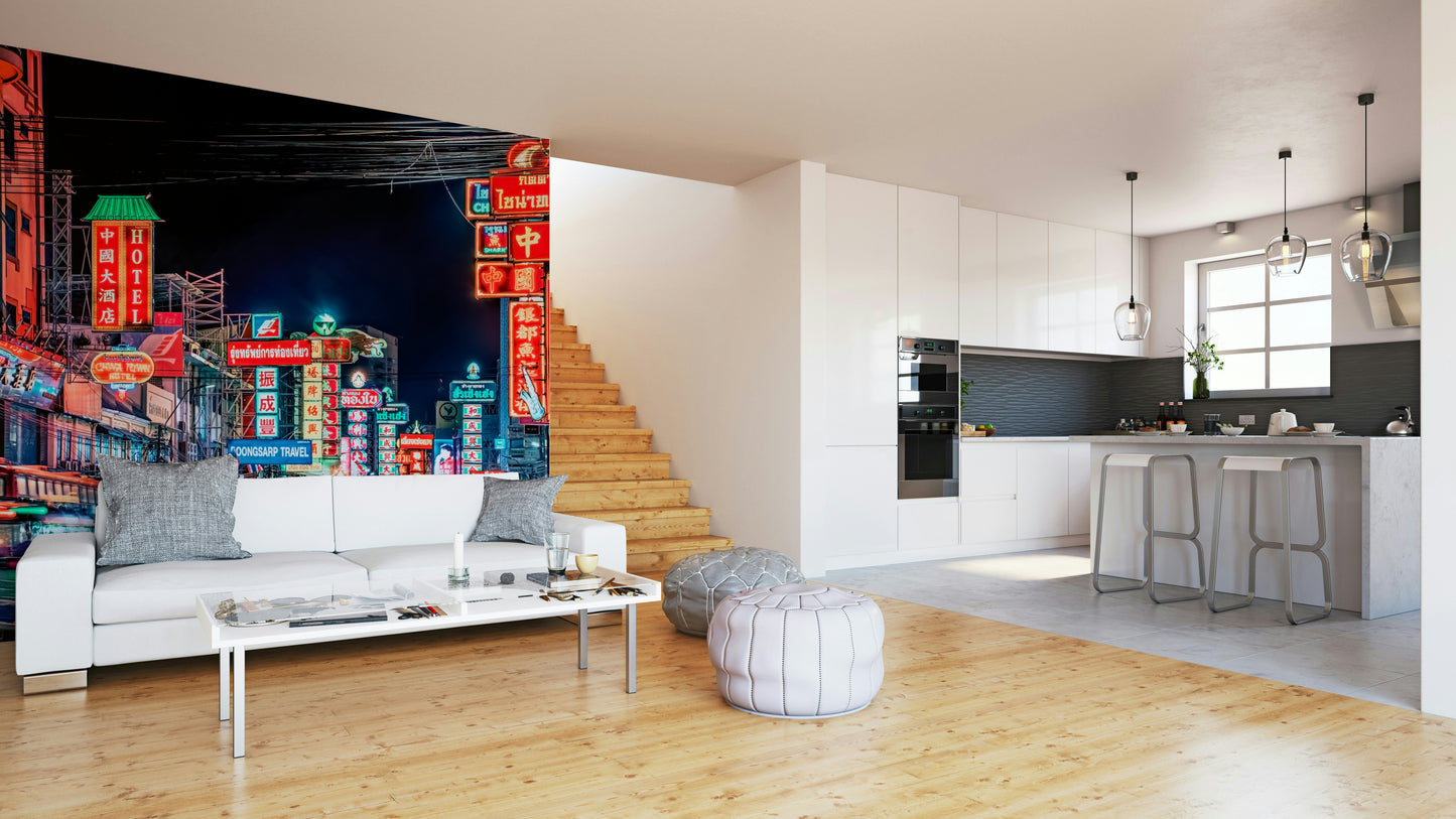 Busy Bangkok street lit up with neon signs

