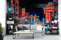 Busy Bangkok street lit up with neon signs

