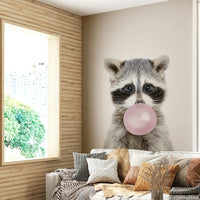 Raccoon chewing pink bubble closeup

