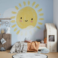 Crayon-style sun and cloud sketch

