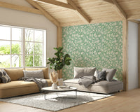 Subtle green wallpaper with leaf motifs

