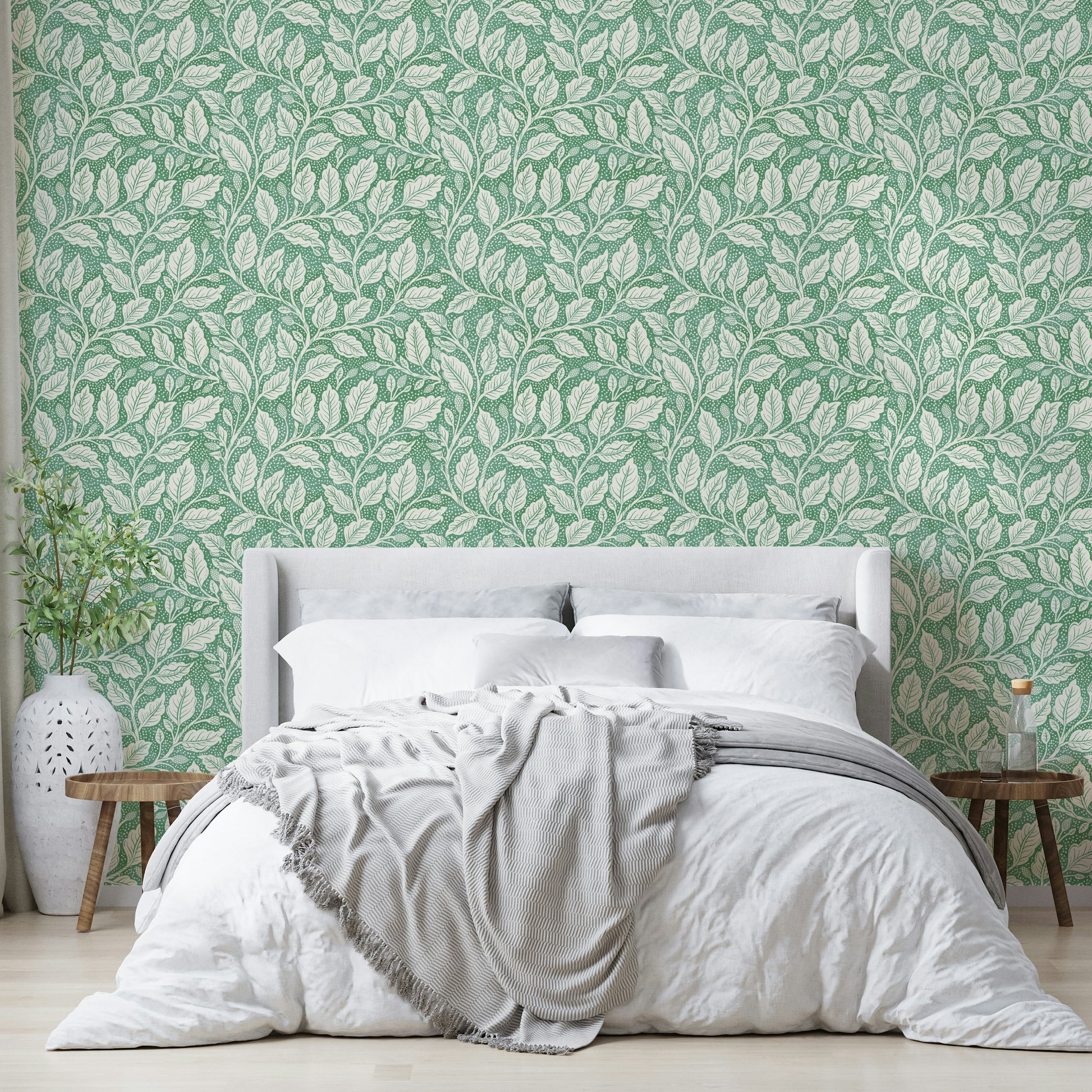 Light green background with floral leaf pattern

