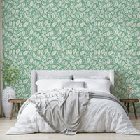 Light green background with floral leaf pattern

