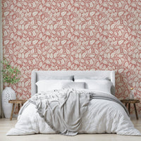 Leaf and branch pattern on red wallpaper

