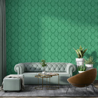 Bedroom accent wall with green leaf design

