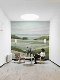 Calm nature mural featuring rolling green hills

