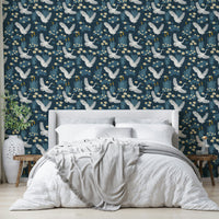 Nature-inspired blue wallpaper with heron motifs

