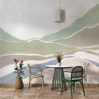 Quiet corner with muted hills mural

