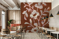 Cozy corner with warm floral wall mural

