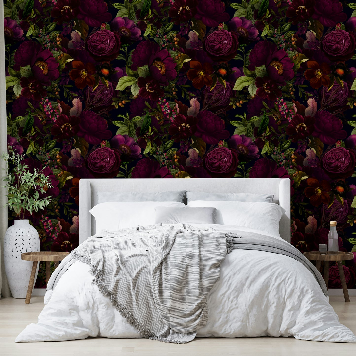Bedroom decorated with moody floral wallpaper

