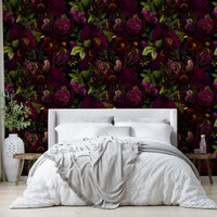 Bedroom decorated with moody floral wallpaper

