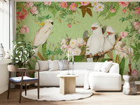 Wall mural featuring roses and white cockatoos birds.

