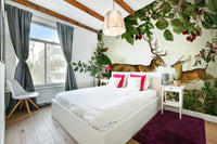 Botanical mural in rich red, orange, and brown hues

