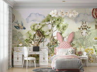 Whimsical animals in a forest setting on wall mural.

