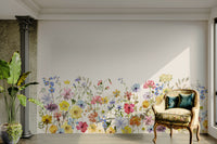 Watercolor meadow mural showcasing wildflowers in gentle hues

