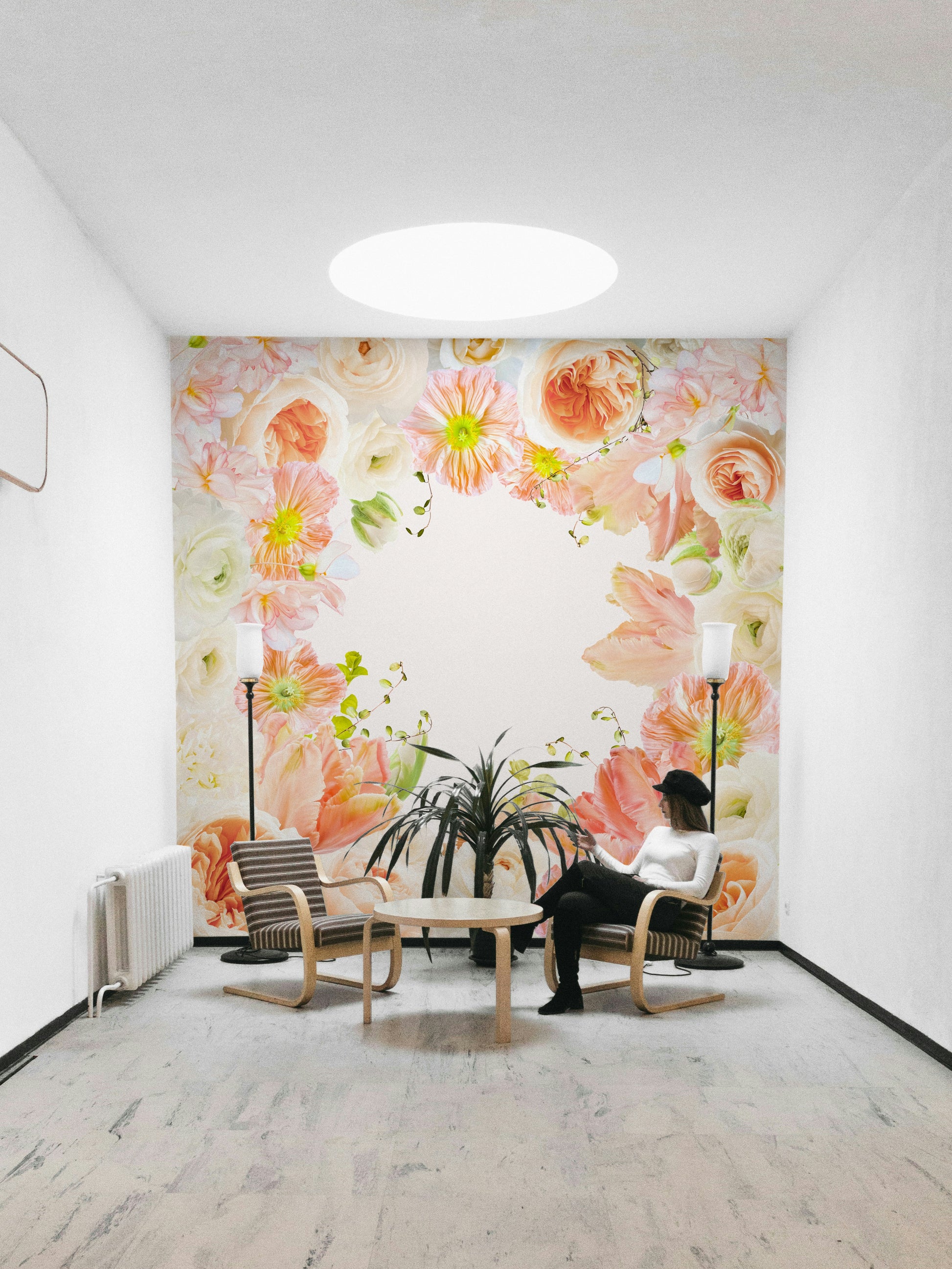 Delicate pastel gradient wall mural in a cozy living room

