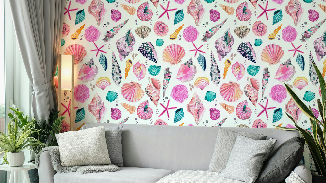 Soft pink wallpaper with marine shells and ocean vibes


