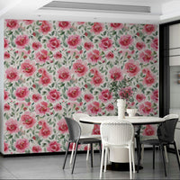 Floral wallpaper with soft red roses and lush green foliage

