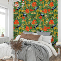 Birds perched on leaves and branches on wallpaper.