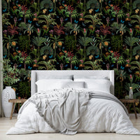 Lush midnight jungle wallpaper with jungle flora