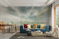 Vintage mural of a tranquil beach with soft ocean waves.

