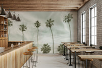 Relaxed coastal mural with vintage palm trees and sand.

