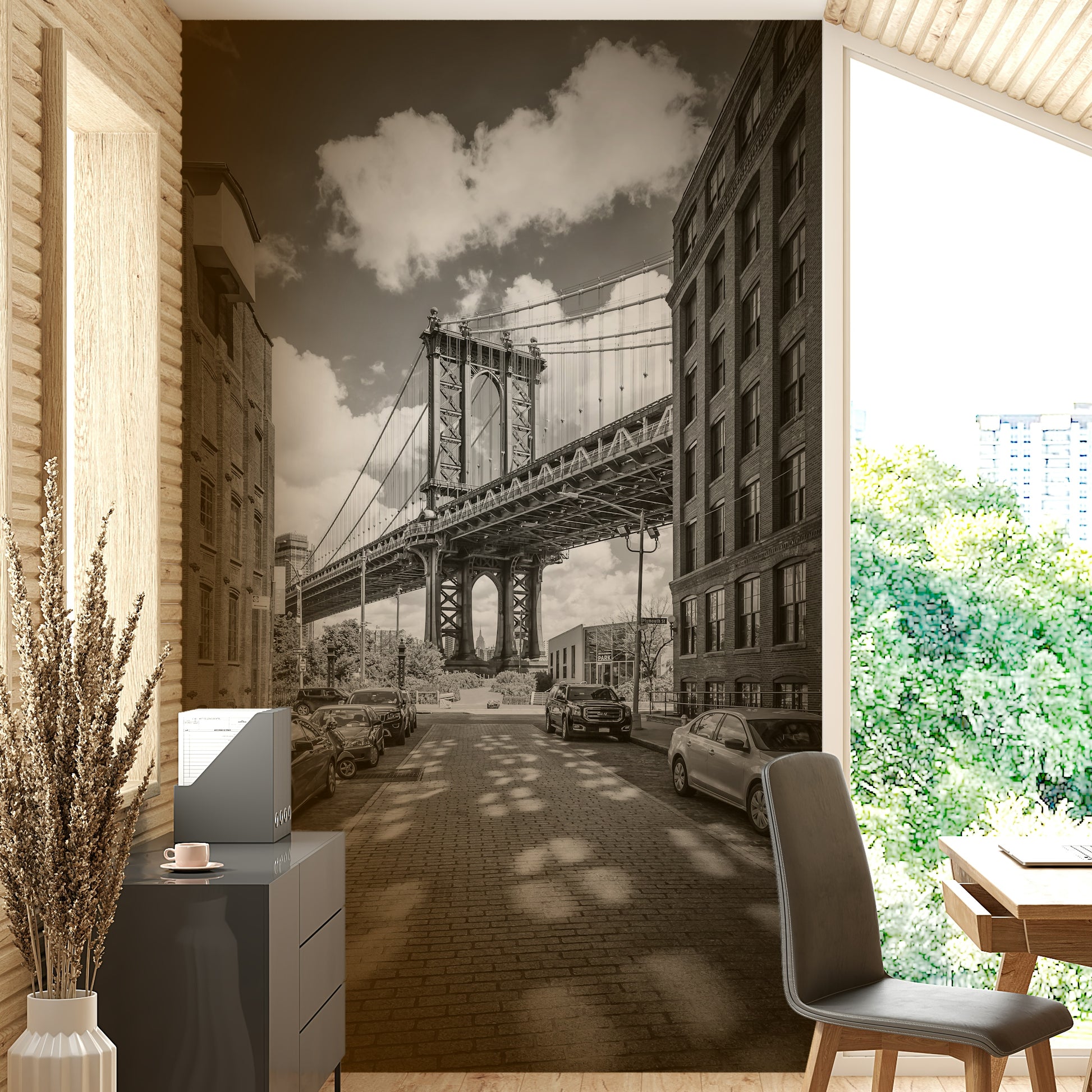 Urban wall art featuring steel structure of Manhattan Bridge.


