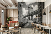 New York City wall mural showing the bridge and city backdrop.

