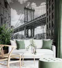 Vintage-style mural with Manhattan Bridge and old NYC charm.

